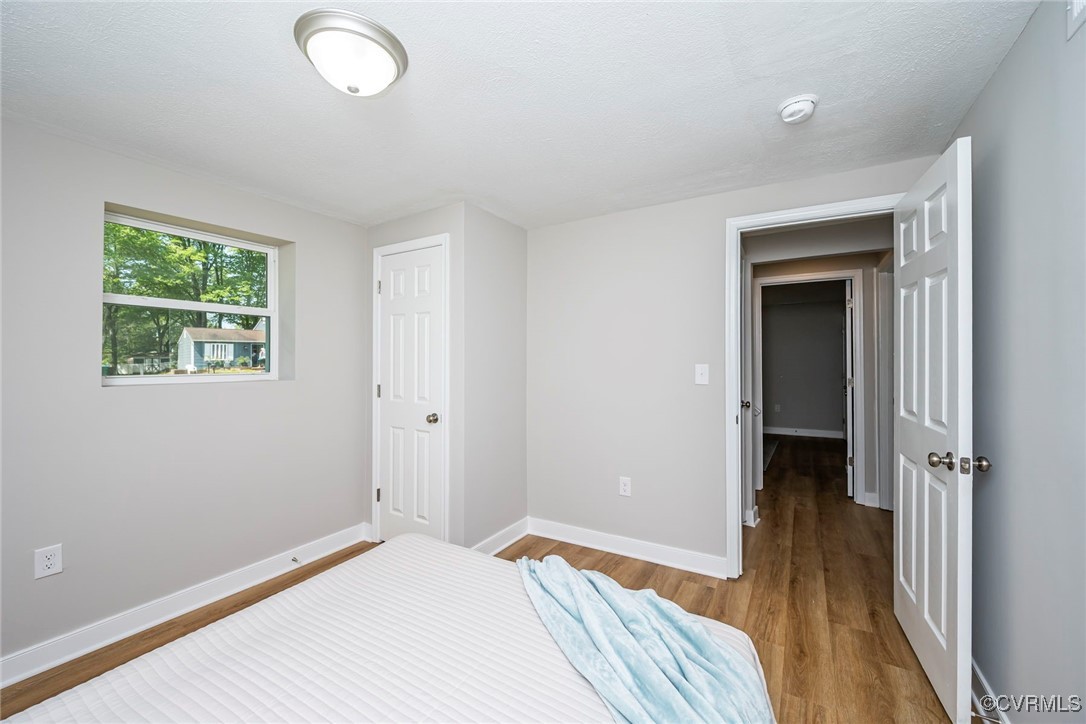 2821 Remington Road Henrico, VA 23231 - Photo 18 of 24 a bedroom with a bed and a window