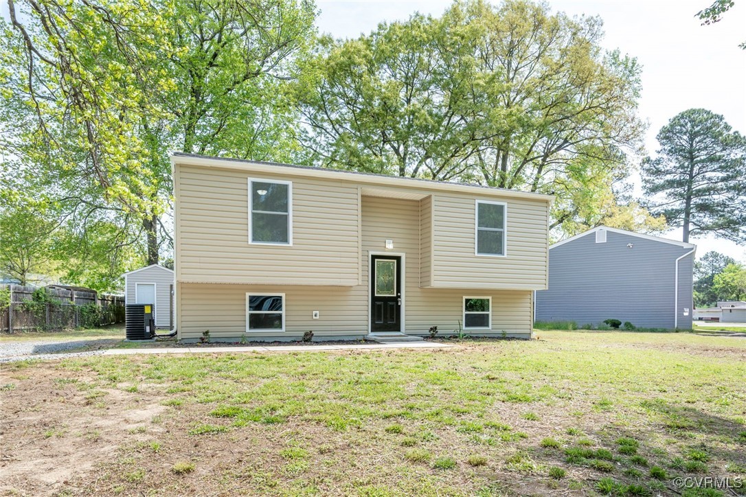 2821 Remington Road Henrico, VA 23231 - Photo 3 of 24 a house that has a tree in front of the house