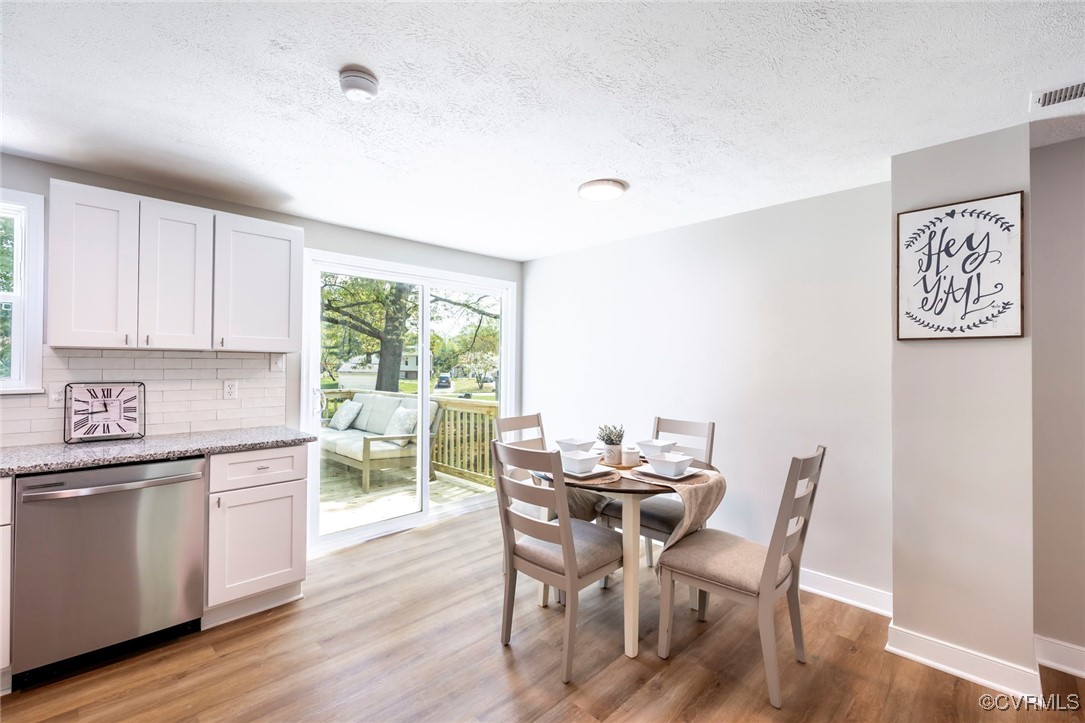 2821 Remington Road Henrico, VA 23231 - Photo 7 of 24 a view of a dining room with furniture window and wooden floor