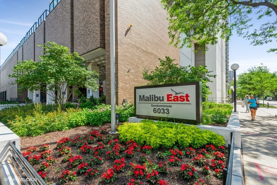 6033 North Sheridan Road, Unit 12K Chicago, IL 60660 - Photo 1 of 11 a sign on the side of the road