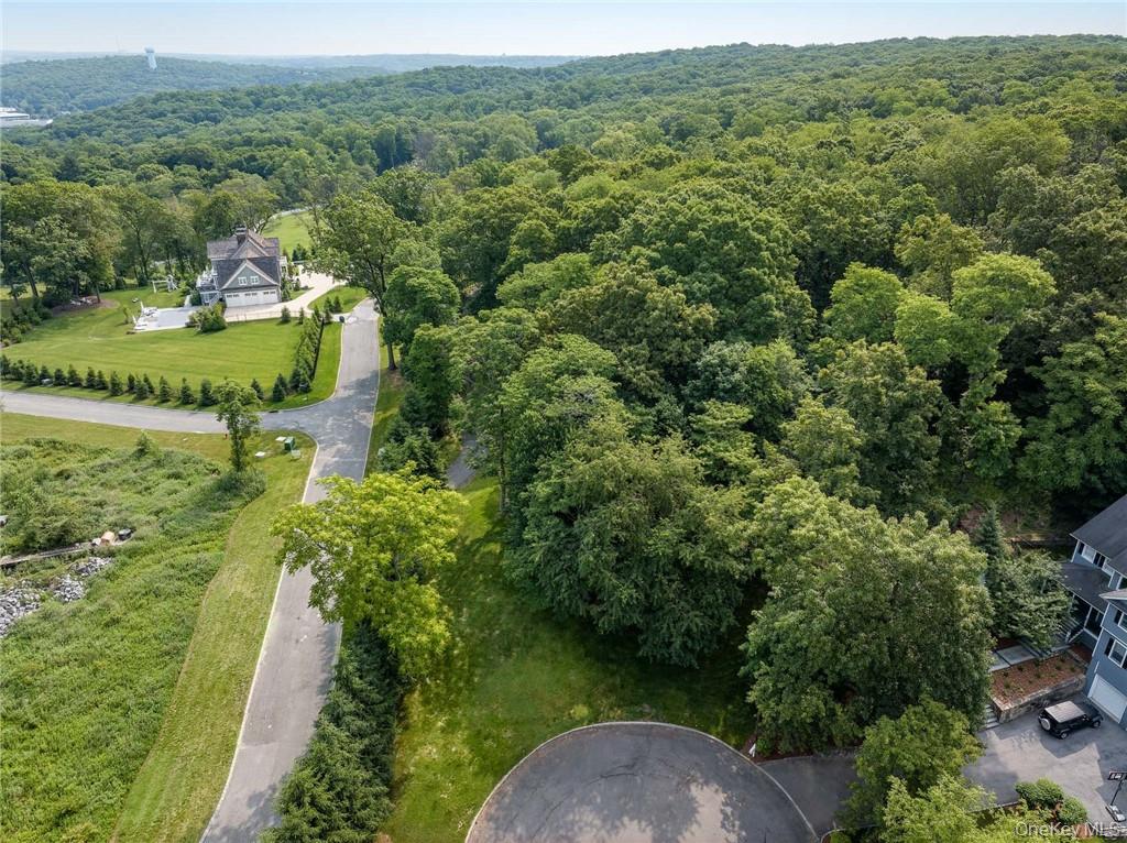 98 Round A Bend Road Tarrytown, NY 10591 - Photo 5 of 5 an aerial view of residential houses with outdoor space and trees