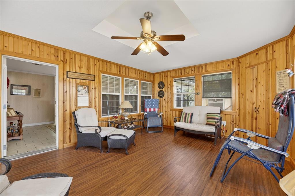 6250 Green Pond Road Polk City, FL 33868 - Photo 3 of 96 a living room with furniture and a large window