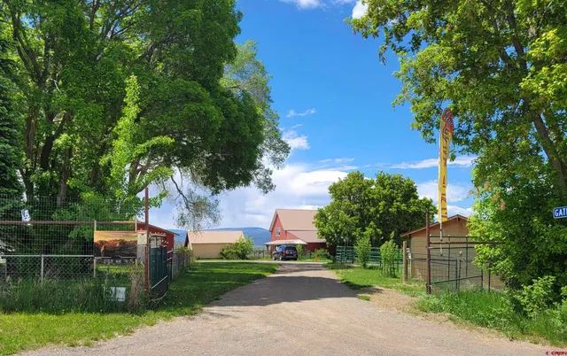 a view of street and electric pole on its side