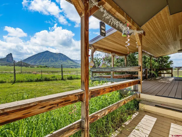 a view of a yard with an outdoor space
