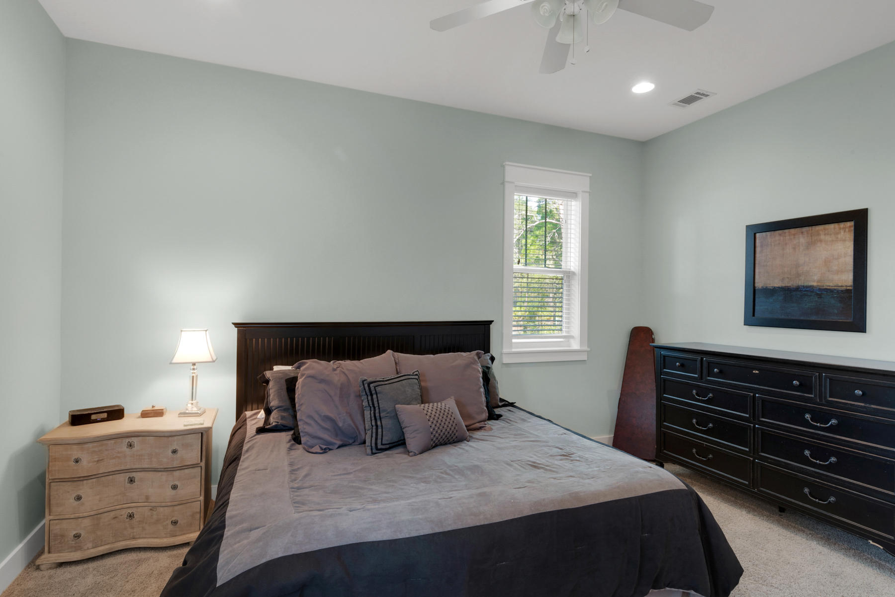 79 Greenway Park Avenue Santa Rosa Beach, FL 32459 - Photo 19 of 41 a bedroom with a bed and a dresser