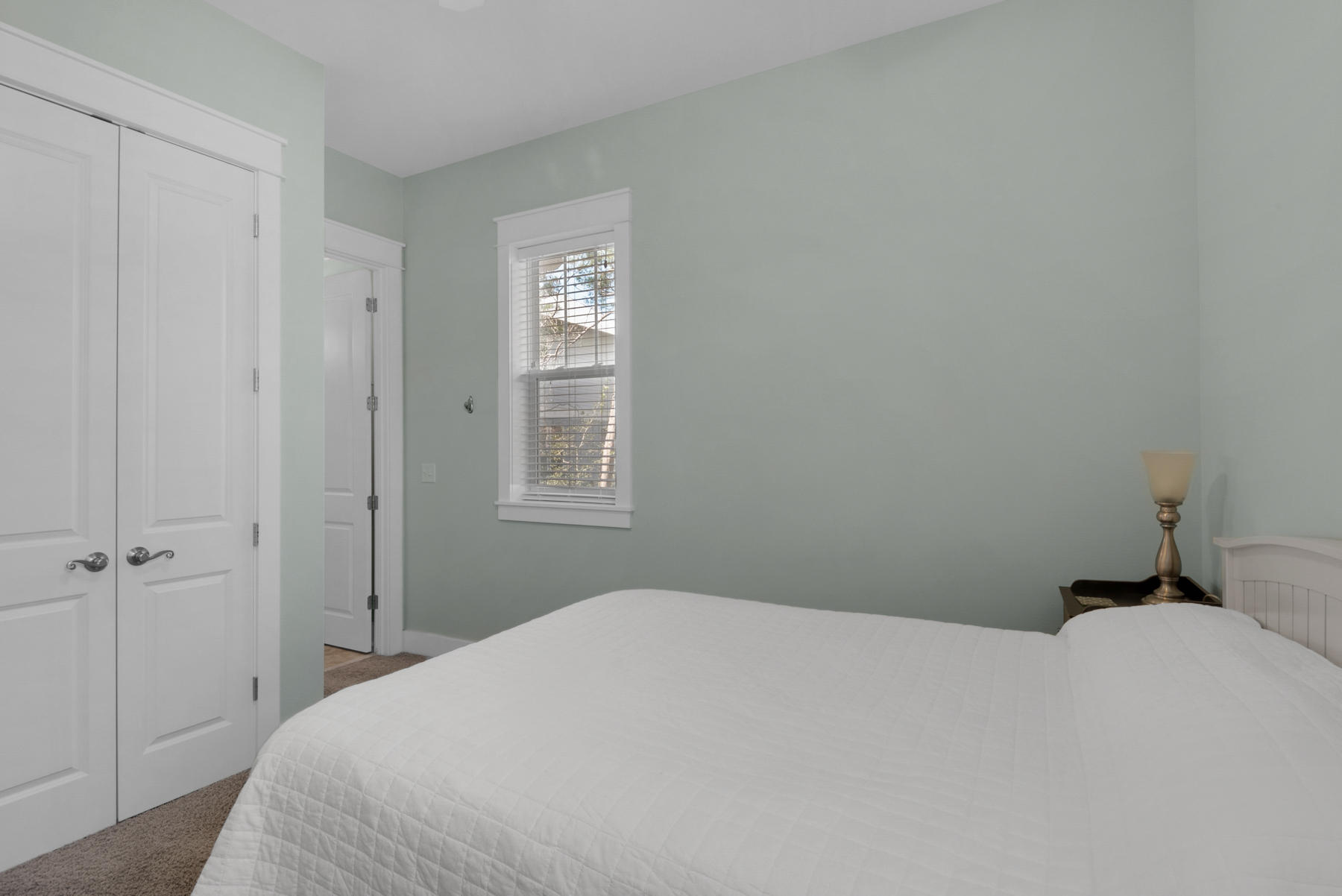 79 Greenway Park Avenue Santa Rosa Beach, FL 32459 - Photo 26 of 41 a bedroom with a bed and a window