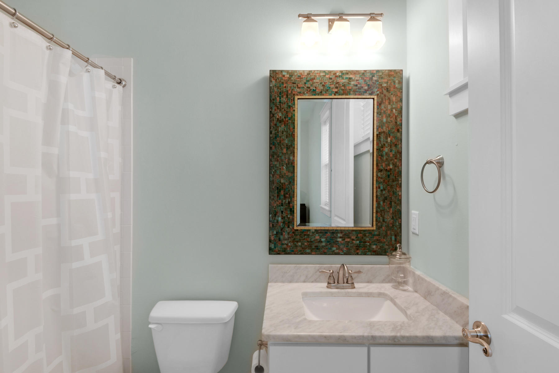79 Greenway Park Avenue Santa Rosa Beach, FL 32459 - Photo 28 of 41 a bathroom with a toilet a sink and mirror