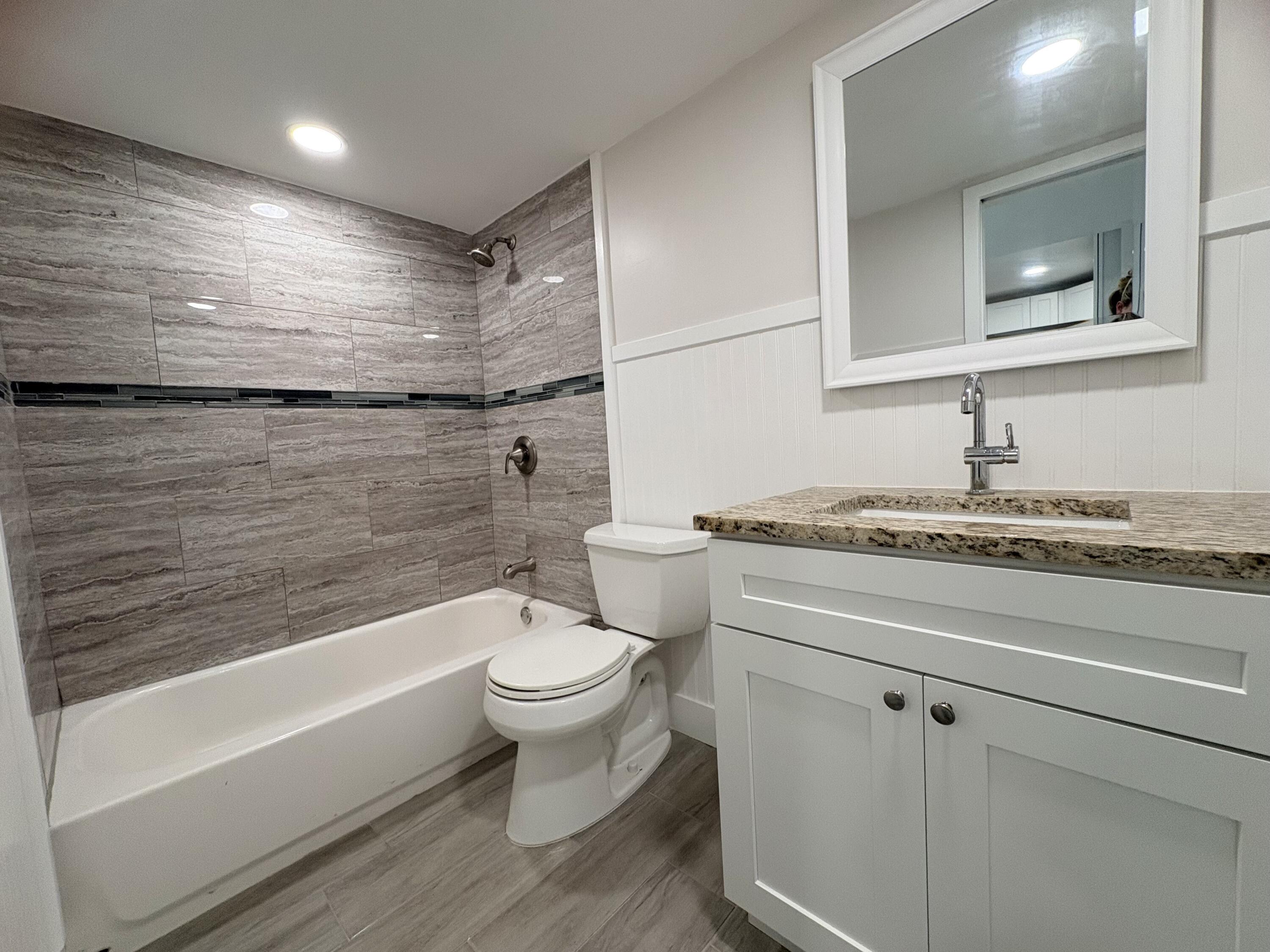 2202 Northeast 36th Street, Unit 17 Lighthouse Point, FL 33064 - Photo 14 of 28 Bathroom1