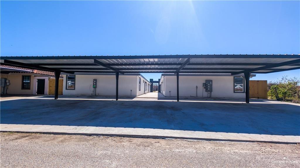 206 South Ridge Avenue, Unit 3 San Juan, TX 78589 - Photo 13 of 13 an empty room with wooden floor and a fireplace
