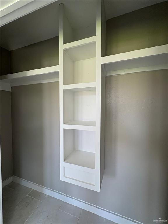 206 South Ridge Avenue, Unit 3 San Juan, TX 78589 - Photo 9 of 13 a view of an empty walk in closet