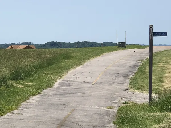 a view of a lake with a big yard