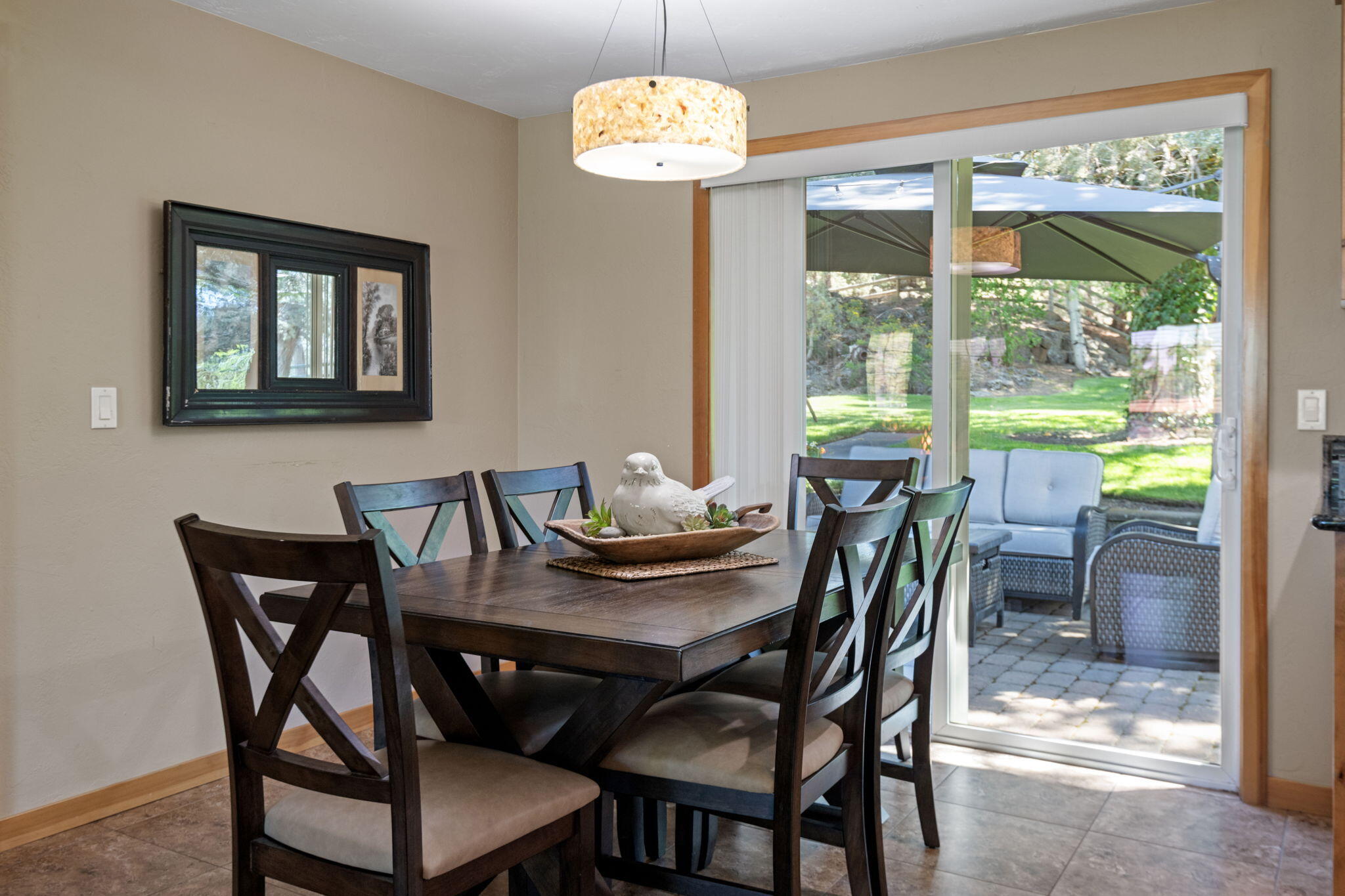 22539 Martee Lane Bend, OR 97701 - Photo 8 of 54 a view of a dining room with furniture wooden floor and a chandelier