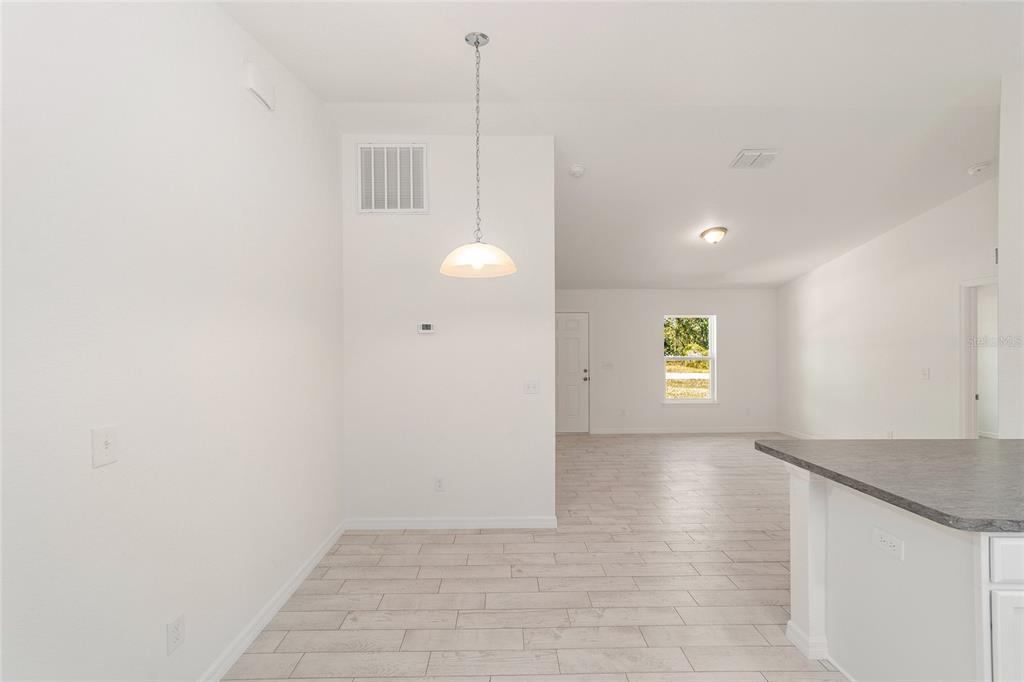 284 Southwest Commodore Road Dunnellon, FL 34431 - Photo 15 of 48 a view of a kitchen with a sink and window