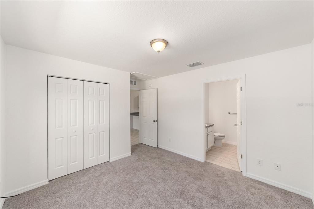 284 Southwest Commodore Road Dunnellon, FL 34431 - Photo 22 of 48 a view of a bathroom with a toilet sink and shower