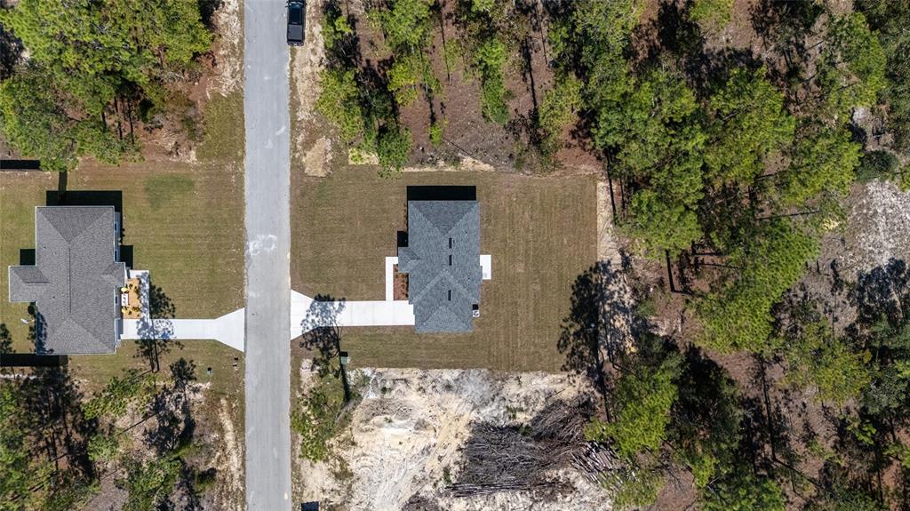 284 Southwest Commodore Road Dunnellon, FL 34431 - Photo 44 of 48 an aerial view of a house with a yard