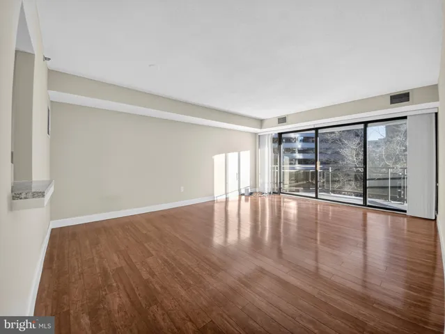 a kitchen with a sink stove and refrigerator