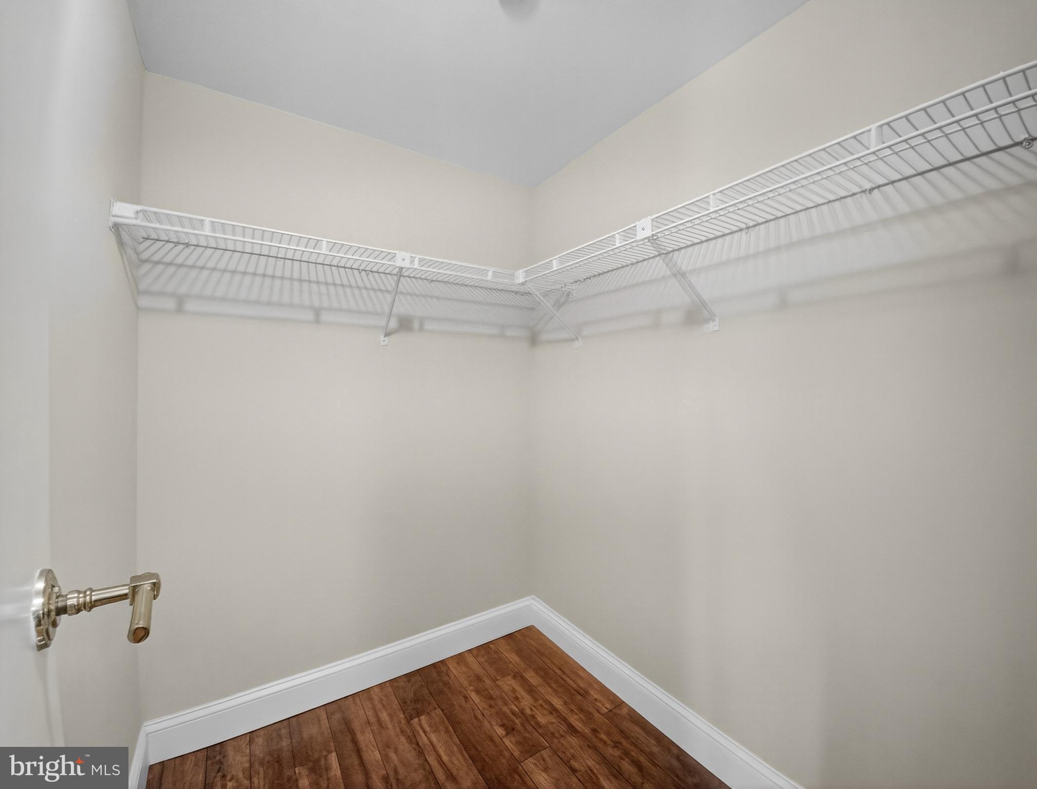 1530 Key Boulevard, Unit 517 Arlington, VA 22209 - Photo 26 of 50 a view of a room with racks on the wall