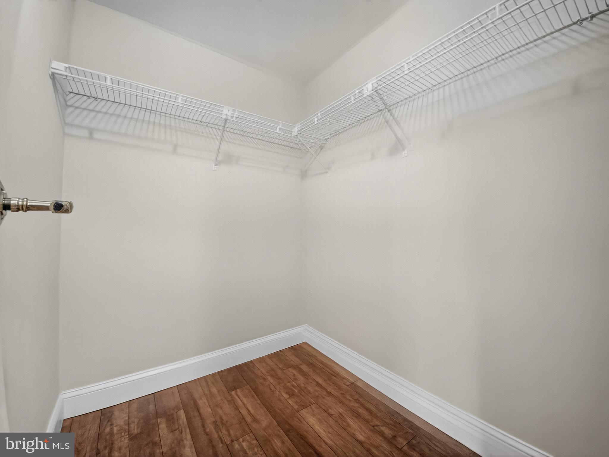 1530 Key Boulevard, Unit 517 Arlington, VA 22209 - Photo 30 of 50 a view of a room with racks on the wall
