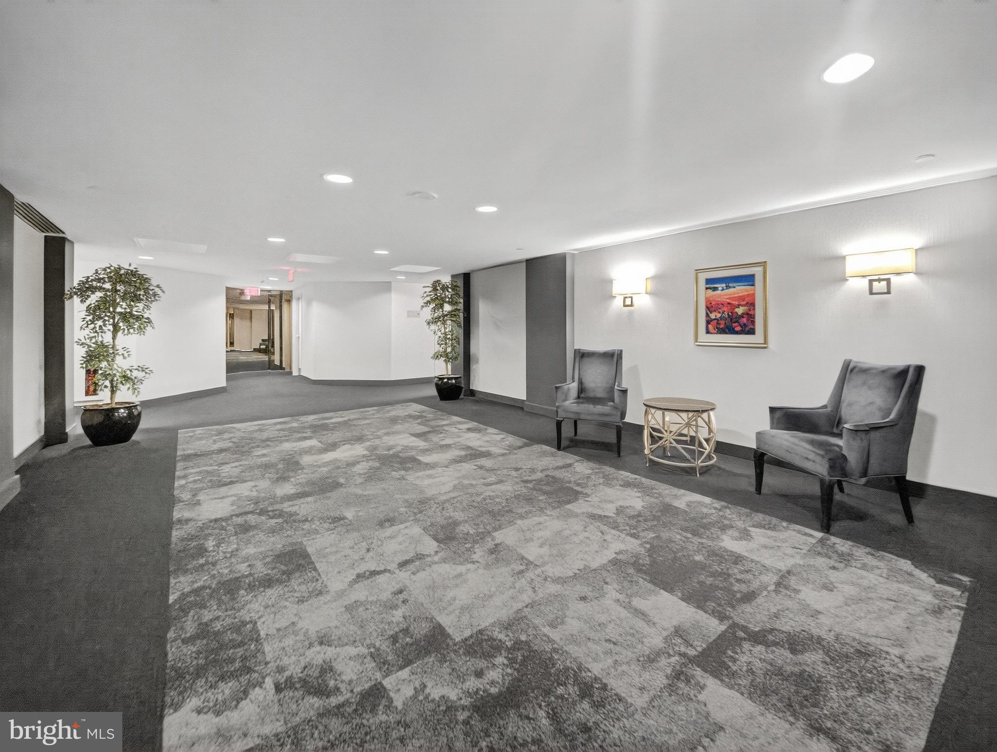 1530 Key Boulevard, Unit 517 Arlington, VA 22209 - Photo 36 of 50 a view of a livingroom with furniture and a flat screen tv