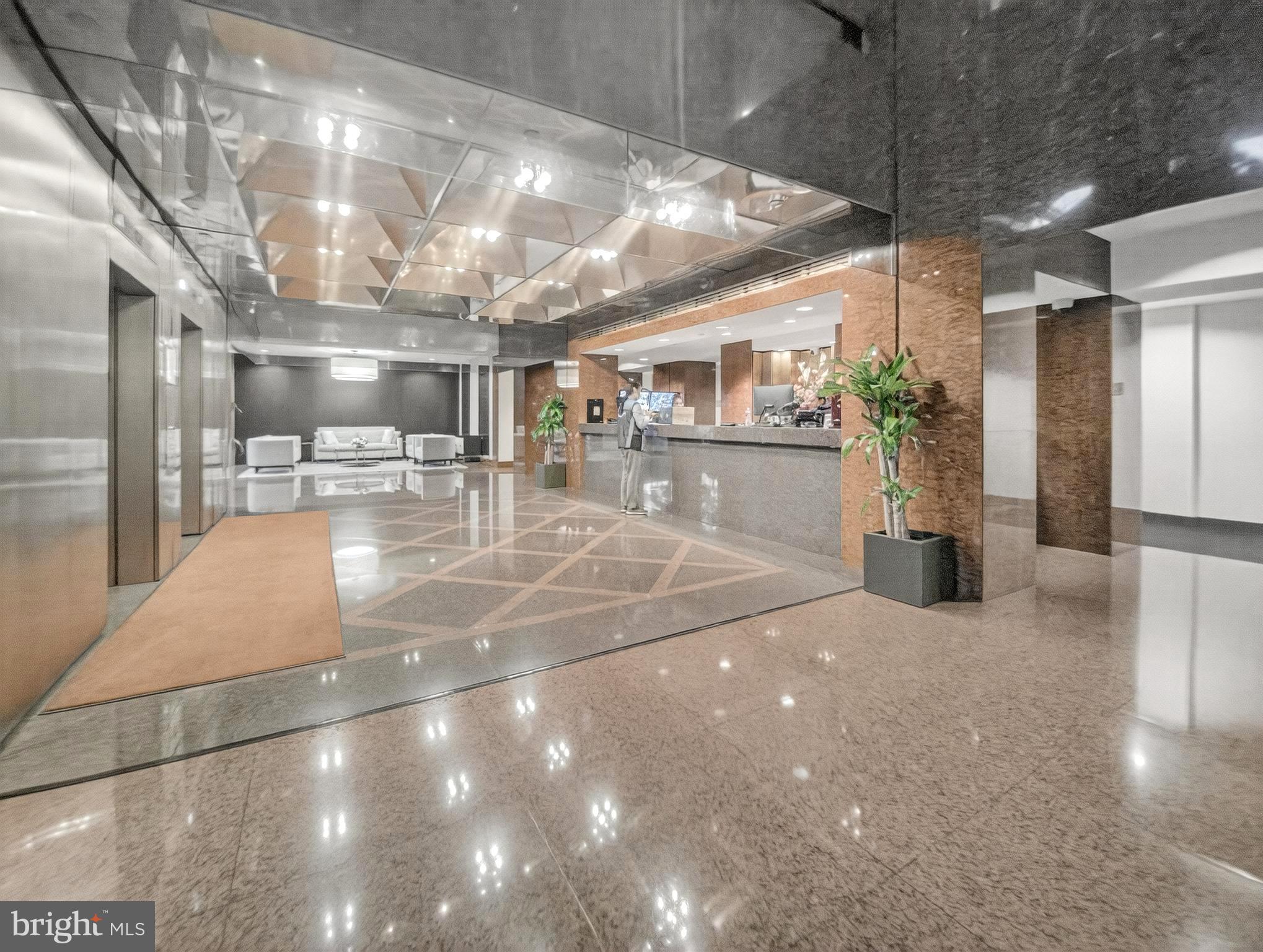 1530 Key Boulevard, Unit 517 Arlington, VA 22209 - Photo 38 of 50 a lobby with gym equipment