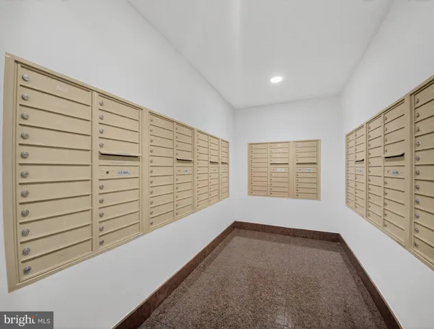 a view of a house with a flower garden