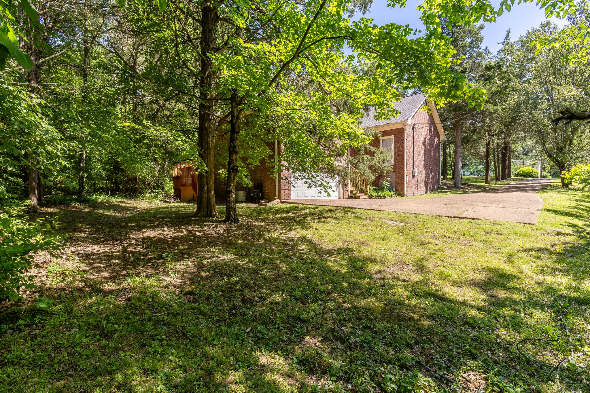1111 Temple Ridge Court Nashville, TN 37221 - Photo 44 of 46 a view of a house with a yard