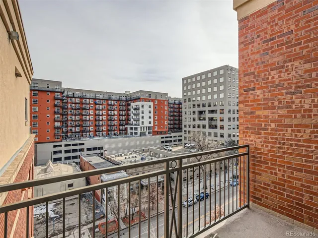 a view of a balcony with city view