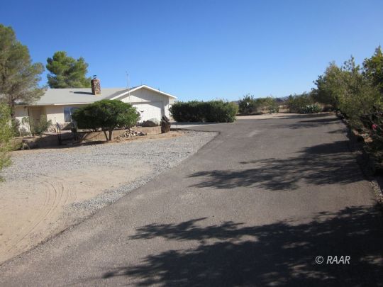 2127 West Ridgecrest Boulevard Ridgecrest, CA 93555 - Photo 30 of 30 a view of a street with a building in the background
