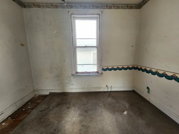an empty room with a window