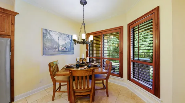 a view of a bathroom with a sink and a mirror