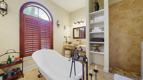 a view of a balcony with furniture