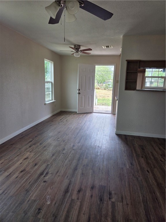 2532 Milo Street Corpus Christi, TX 78415 - Photo 3 of 7 wooden floor in an empty room with a window