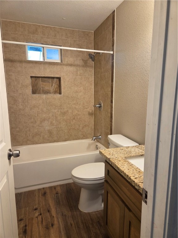 2532 Milo Street Corpus Christi, TX 78415 - Photo 7 of 7 a bathroom with a granite countertop sink toilet and shower