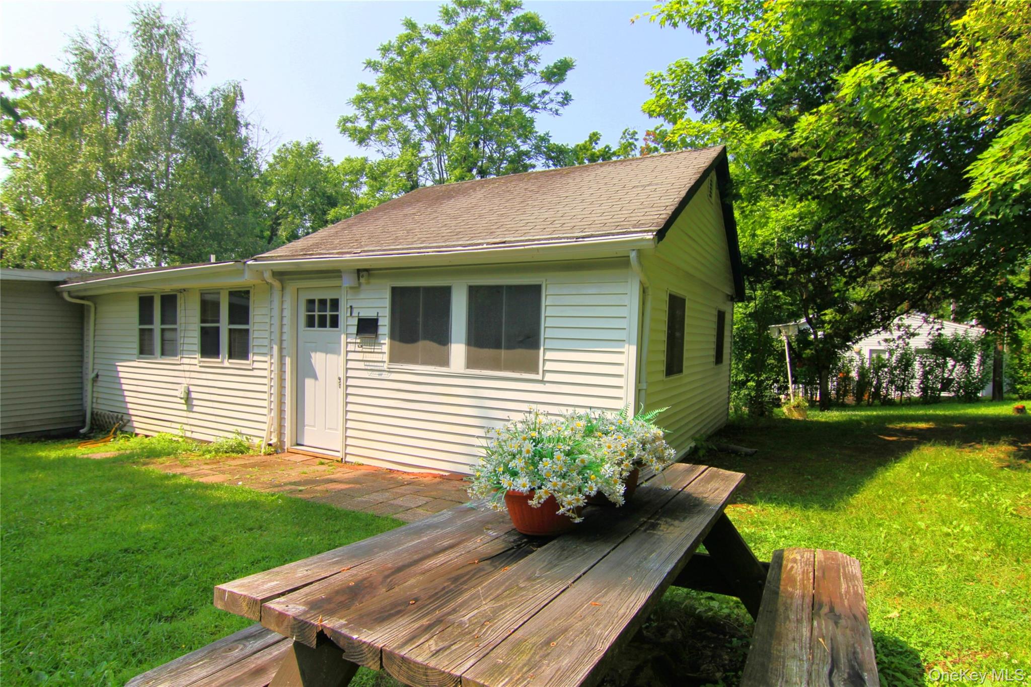 a house with garden in front of it