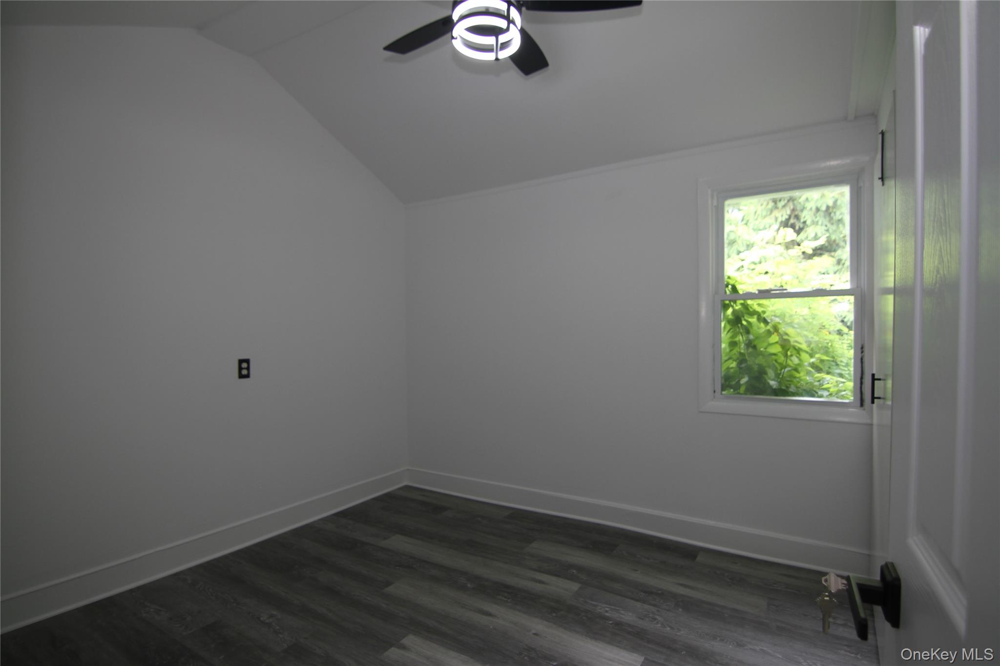 191 Sylvan Lake Road, Unit 1 Hopewell Junction, NY 12533 - Photo 25 of 36 an empty room with a window