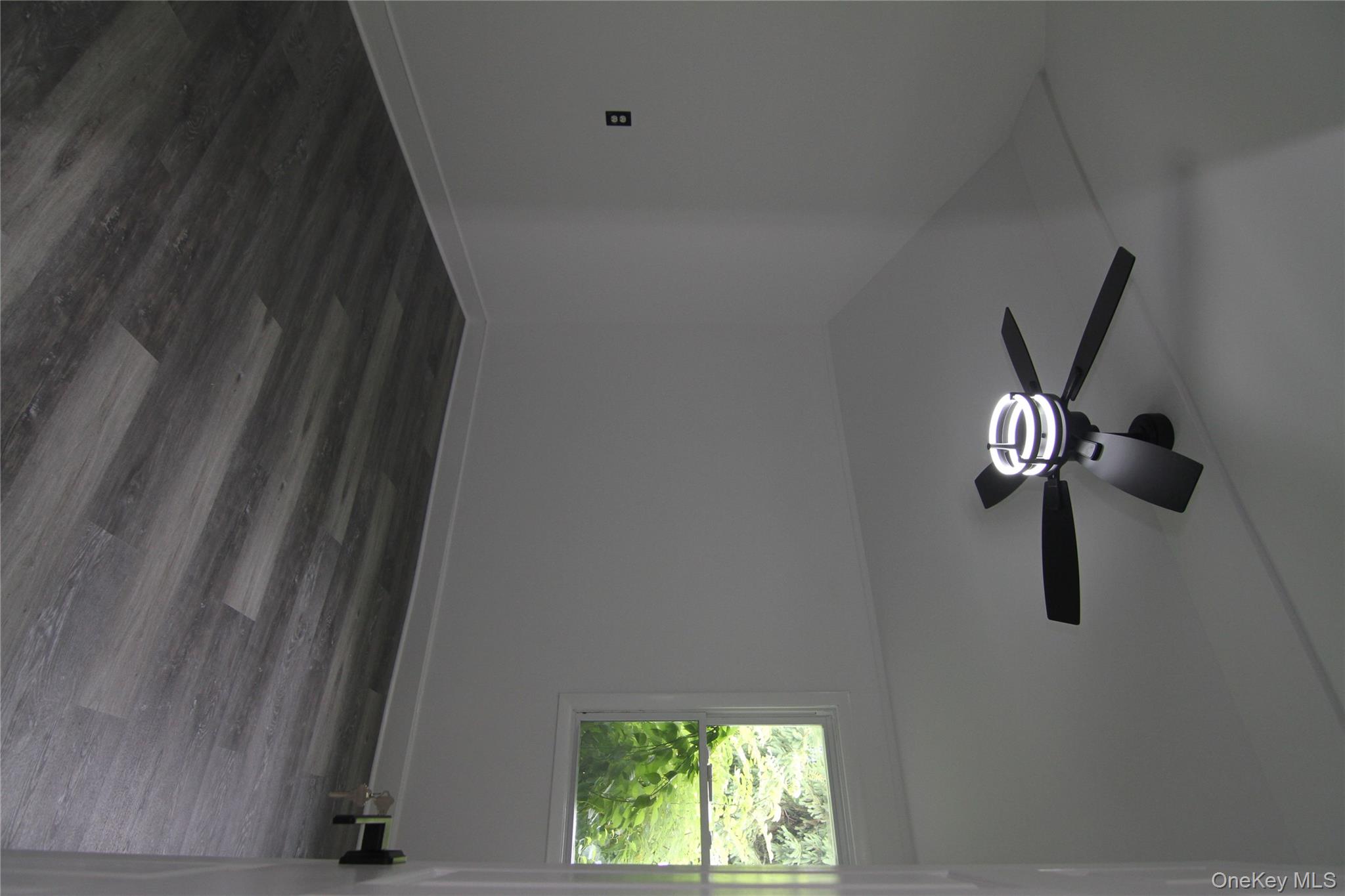 191 Sylvan Lake Road, Unit 1 Hopewell Junction, NY 12533 - Photo 26 of 36 a view of a room with wooden floor and windows