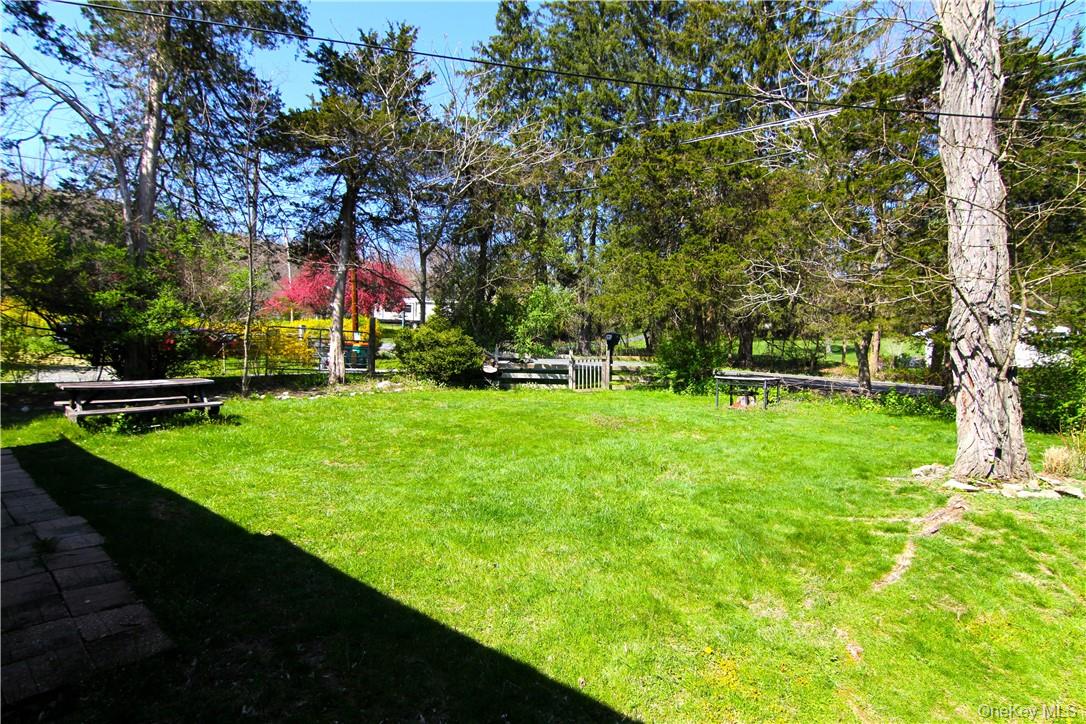 191 Sylvan Lake Road, Unit 1 Hopewell Junction, NY 12533 - Photo 4 of 36 a view of a park with large trees