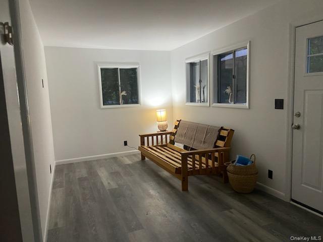 191 Sylvan Lake Road, Unit 1 Hopewell Junction, NY 12533 - Photo 10 of 36 a living room with furniture and a window