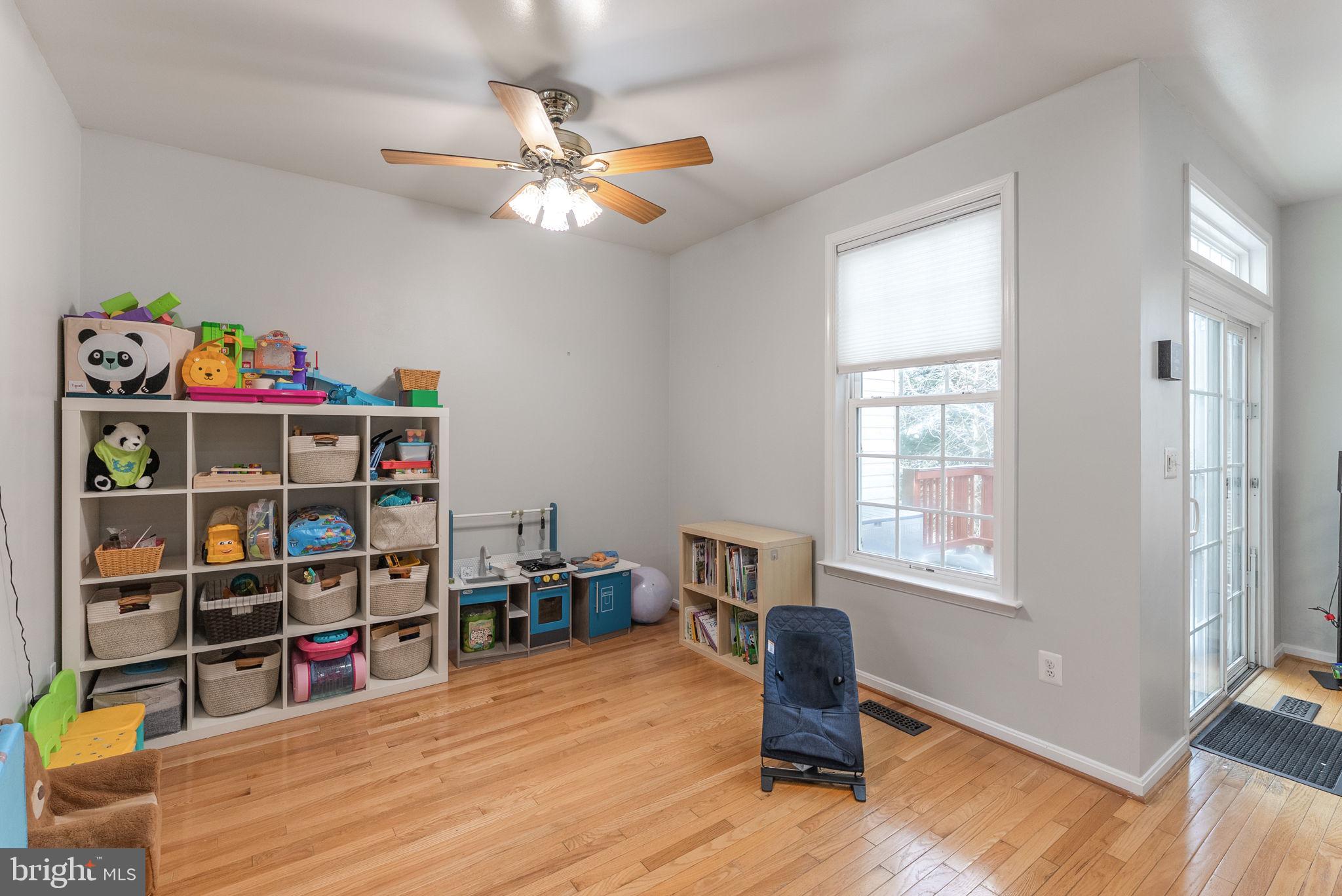 3392 Beechcliff Drive Alexandria, VA 22306 - Photo 11 of 25 a room with furniture and a wooden floor