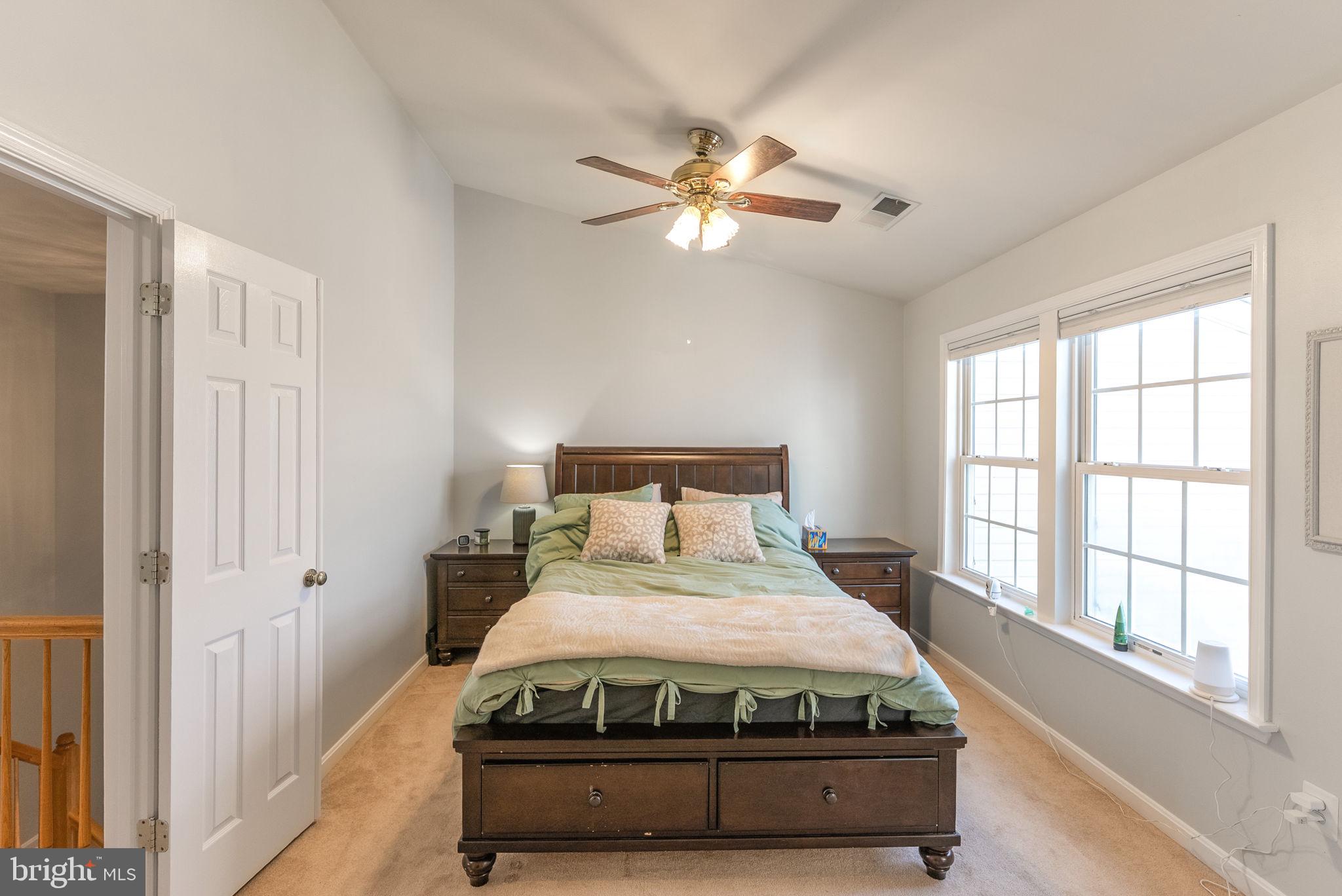 3392 Beechcliff Drive Alexandria, VA 22306 - Photo 14 of 25 a bedroom with a bed and window