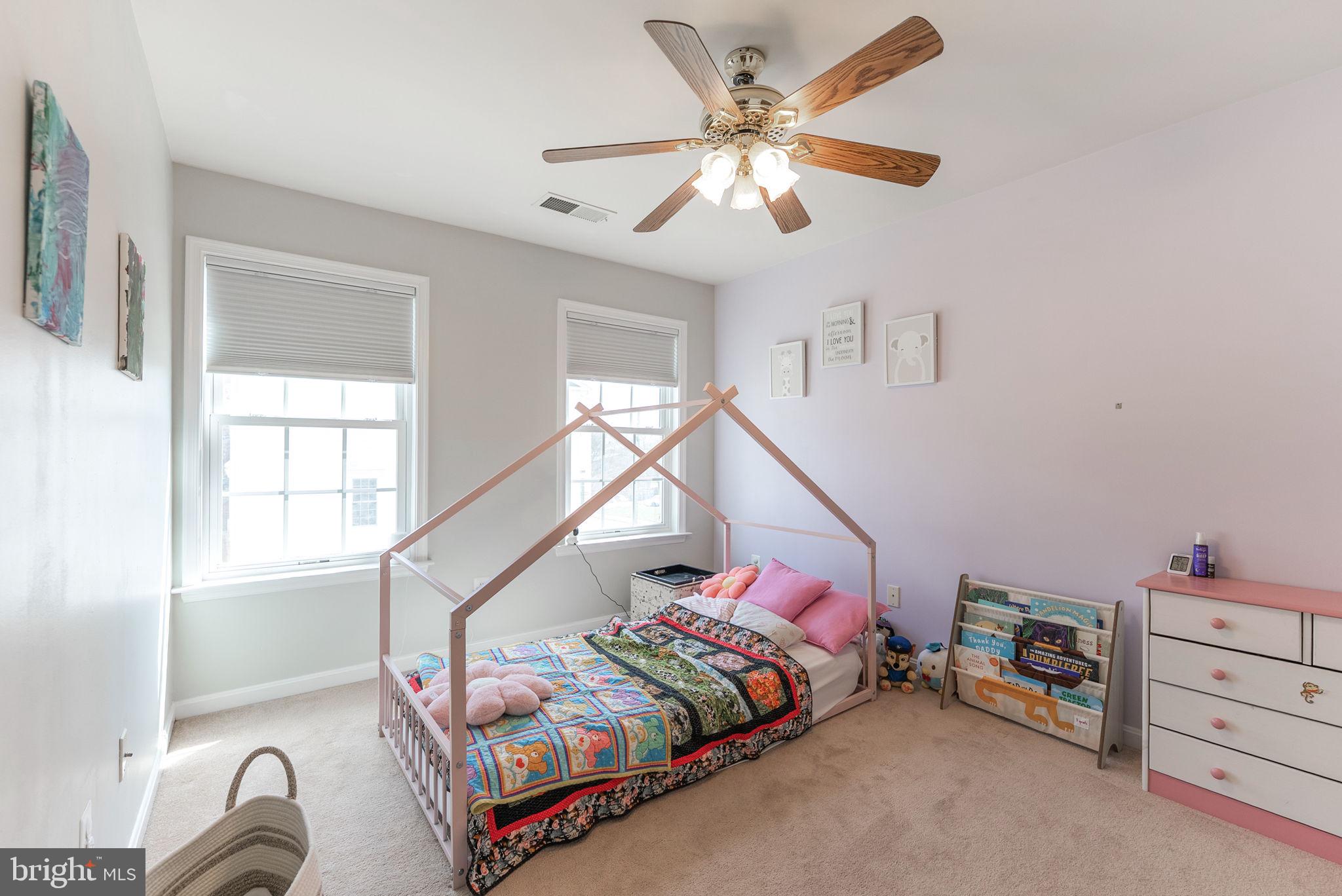 3392 Beechcliff Drive Alexandria, VA 22306 - Photo 17 of 25 a bedroom with bed and a window