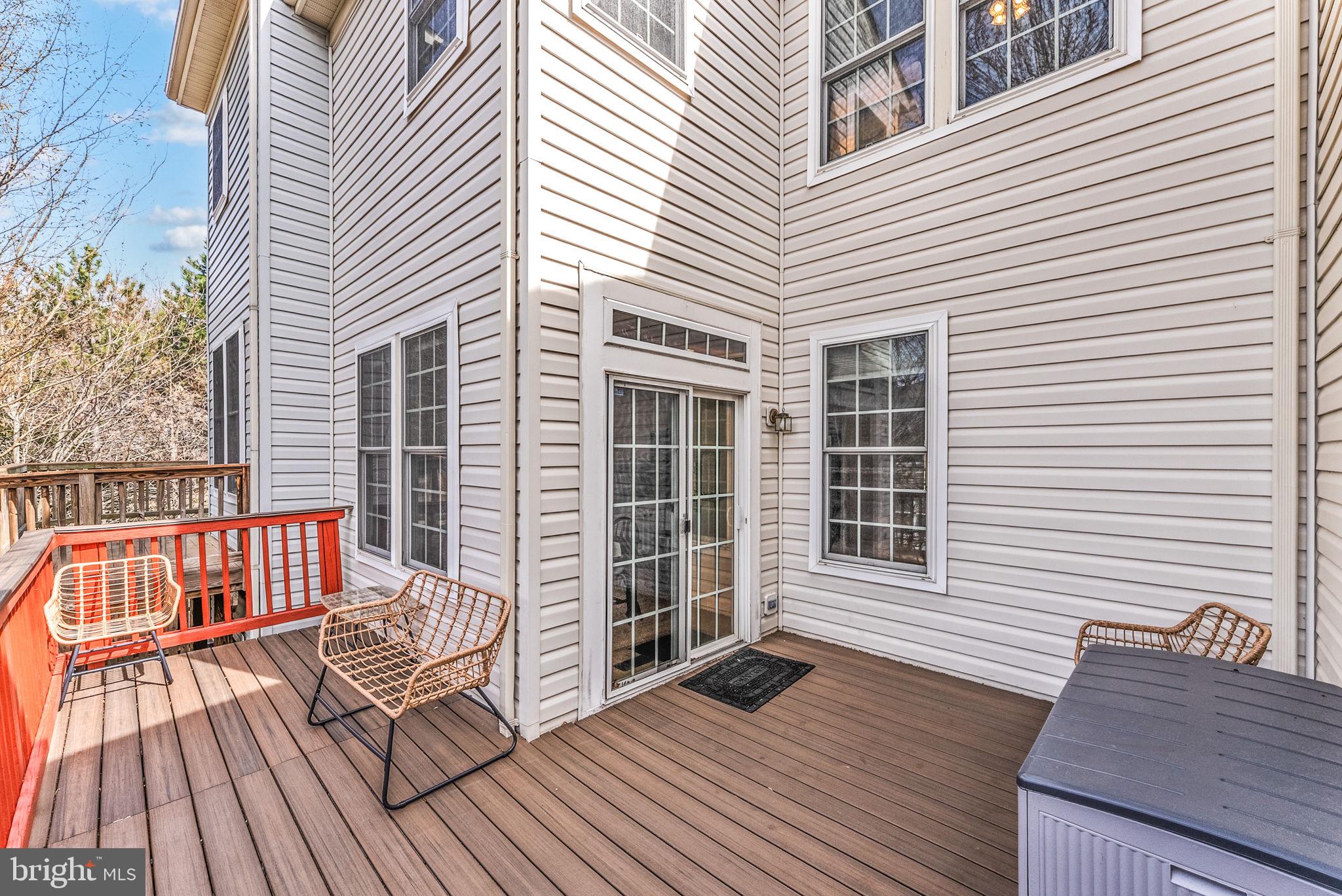 3392 Beechcliff Drive Alexandria, VA 22306 - Photo 23 of 25 a view of a roof deck with wooden floor and fence