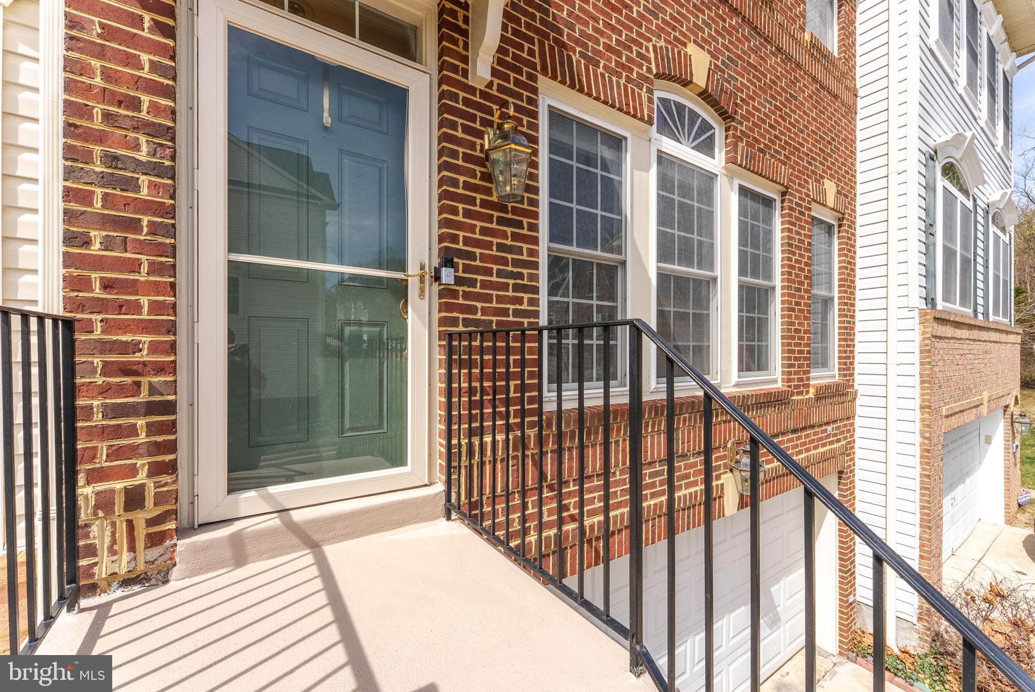 3392 Beechcliff Drive Alexandria, VA 22306 - Photo 3 of 25 a view of a balcony with a potted plant
