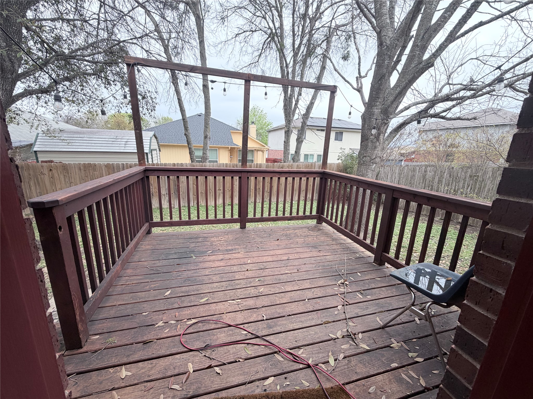 20809 Pacers Gait Lane Pflugerville, TX 78660 - Photo 16 of 23 a view of balcony with wooden floor and fence