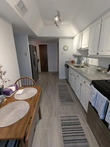 a kitchen with sink and view kitchen