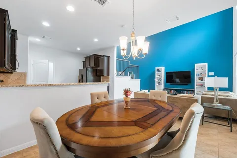 a room with furniture and a flat screen tv