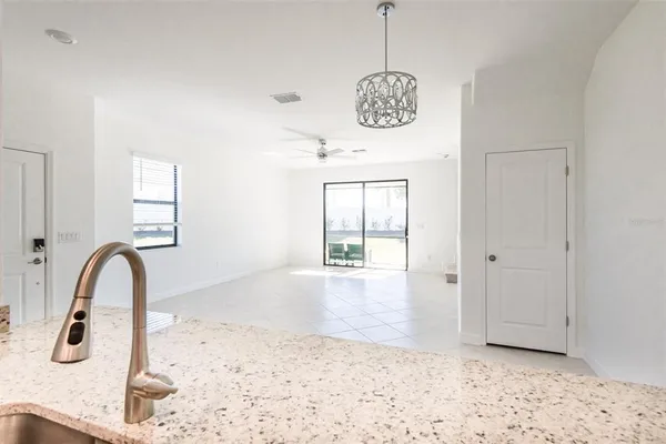 a view of a center island and bedroom