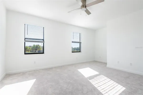 an empty room with windows