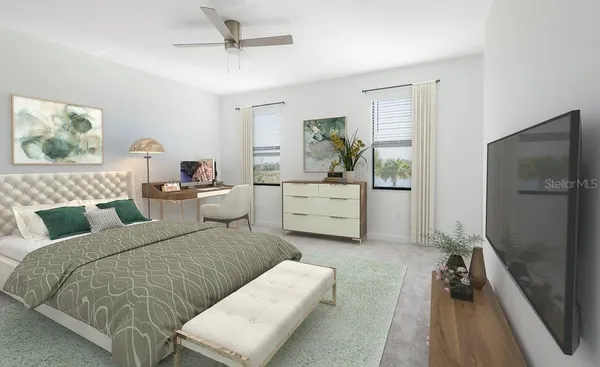 a bedroom with a bed and a couch