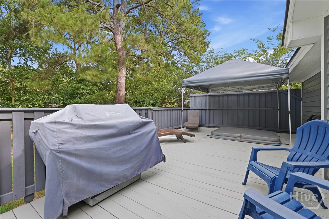3 Rice Mill Drive Savannah, GA 31419 - Photo 25 of 37 Large outdoor backyard deck features an area for grilling, sun bathing and a hot tub.